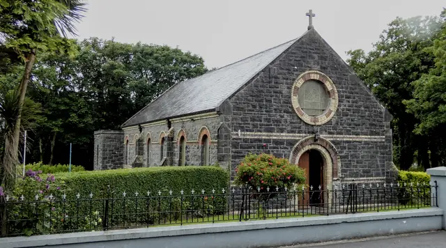 A stone church and its garden
